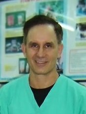 Dr Charles Craft - Dentist at East Meets West Dental Center