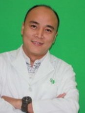 Dr Tran Duc Hao -  at O'Care Dental Clinic