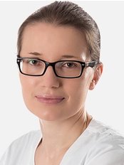 Dr Marta Malek -  at Clinica Dermatologica
