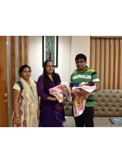 Apoorva IVF & Laparoscope Centre - Rita and Rohan Thakur with their twins. 
