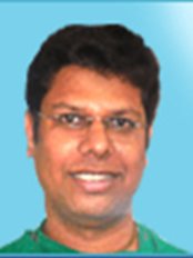 Dr Ashok Sinha - Doctor at Rejoice Hair Studio - Bangalore