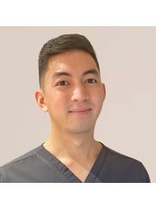 Dr Nico Dela Cruz - Surgeon at Clinique de Paris