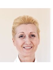 Dr Adigoni Mahera - Surgeon at Swiss Luxury Clinic - Switzerland