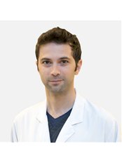 Dr Agah Isgüzar -  at KOC Healthcare - Hair Loss