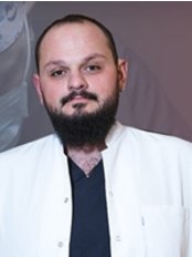 Batuhan Kurtoglu - Chirurg - TRANSES Klinik für Haartransplantationen