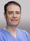 FUE Clinics Hair Transplants London - Dr. Rogers is a veteran in the field of hair restoration. Having accrued over 20 years experience, he is an outstanding hair transplant surgeon who specialises in FUT (Strip Harvesting).  