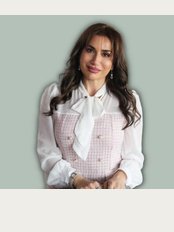 Dr. Carla Kesrouani - Dr. Carla Kesrouani