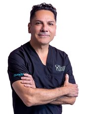 Dr. Manuel Huesca - Plastic Surgery Clinic in Mexico