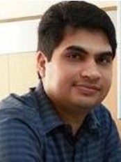 Dr. Nitin Mittal - Dr. Nitin Mittal qualified in Medicine from the University of Manipal, India. He then under went ENT and Head & Neck Cancer training in Manipal, India.