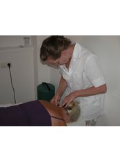 Phoenix Acupuncture - Deeva Eastwood giving a treatment