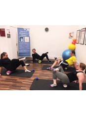 First Class Physiotherapy - Foam rolling class in action!