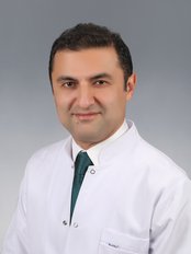 Assoc. Prof. Dr. Mehmet Emre Dinc - Istanbul Rhinoplasty Center - Plastic Surgery Clinic in Turkey