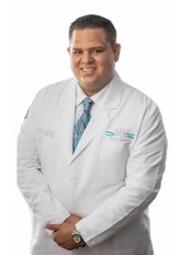 Dr. Alex Ulloa - Dental Clinic in Mexico
