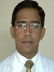 Dr. Gogias Denta Cinic - Dr.Pradeep Gogia, MDS