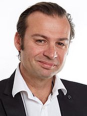 Dr. Eric Rondini-Gilli - Plastic Surgery Clinic in France
